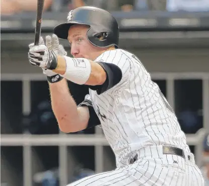  ?? | NAM Y. HUH/ AP ?? White Sox third baseman Todd Frazier went 1- for- 4, including this double in the first inning Saturday.