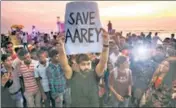  ?? AP ?? ■ People protesting against cutting down of trees for a proposed metro car shed project at Aarey Colony in Mumbai on Sunday.