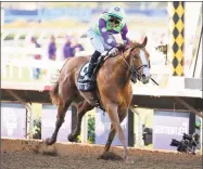  ?? Denis Poroy / Associated Press ?? In this Nov. 4, 2017, file photo, Jose Ortiz rides Good Magic to victory in the Sentient Jet Juvenile horse race during the Breeders’ Cup in Del Mar, Calif.
