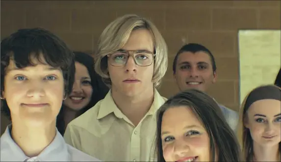  ??  ?? Ross Lynch (center) in "My Friend Dahmer." His portrayal of serial killer Jeffrey Dhamer is chilling.