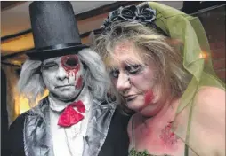  ?? FM4560278 ?? Licensees Steve and Pauline Millsom gave their customers the creeps at Halloween party held at the Good Intent