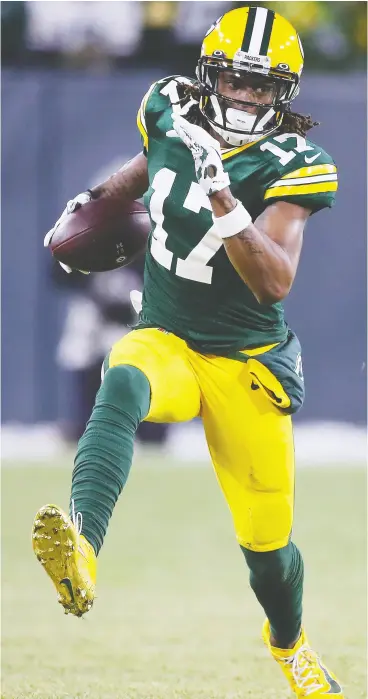  ?? GREGORY SHAMUS / GETTY IMAGES FILES ?? Davante Adams caught 115 passes this season for 1,374 yards and 18 TDS despite missing two games. Hall of Fame QB Kurt Warner says Adams is now one of the greats at his position.