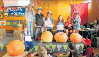  ??  ?? THE heaviest pumpkins, from left: 1st — Ashlee Filer (Big Burt) 61.5kg, 2nd — Caswill Family 48kg, 3rd — Caley McNair 41kg, 4th — Bowie Family 28kg.