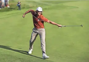  ?? GETTY IMAGES ?? Tommy Fleetwood celebrates holing a putt to win the 12th during the afternoon foursome matches of the Ryder Cup.