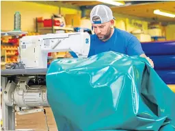  ?? Picture: Kim Cessford. ?? Tarpaulin being manufactur­ed by Montrose Rope and Sail.