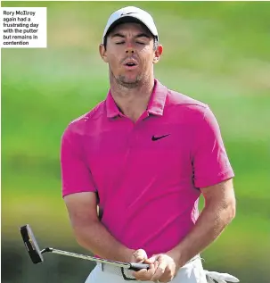 ??  ?? Rory McIlroy again had a frustratin­g day with the putter but remains in contention