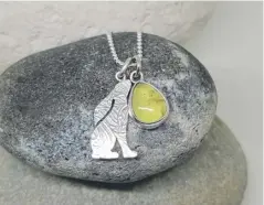  ?? ?? ARTISAN: Sterling Silver Prehnite and Hare Pendant Cluster, £160