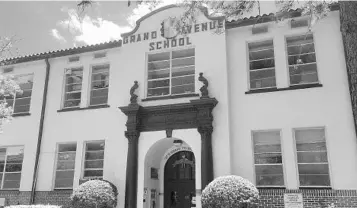  ?? STAFF FILE PHOTO ?? For 90 years, students from Orlando’s Holden Heights neighborho­od walked through the arched doorway of Grand Avenue School. Now, it will become the new home for services currently offered by the city’s Downtown Recreation Complex.