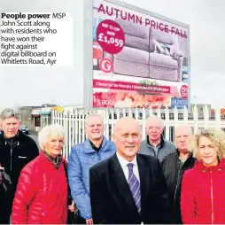  ??  ?? People power MSP John Scott along with residents who have won their fight against digital billboard on Whitletts Road, Ayr