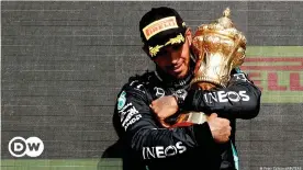  ??  ?? Lewis Hamilton celebrates winning his eight home Grand Prix at Silverston­e.