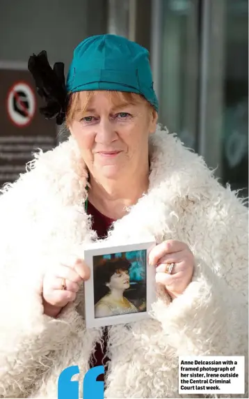  ??  ?? Anne Delcassian with a framed photograph of her sister, Irene outside the Central Criminal Court last week.