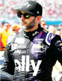  ??  ?? Jimmie Johnson stands outside his care prior to a NASCAR Cup Series race at Phoenix Raceway on March 8. (Photo by Ralph Freso, AP file)