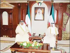  ??  ?? HH Crown Prince receives acting PM Sheikh Sabah Al-Khaled.
