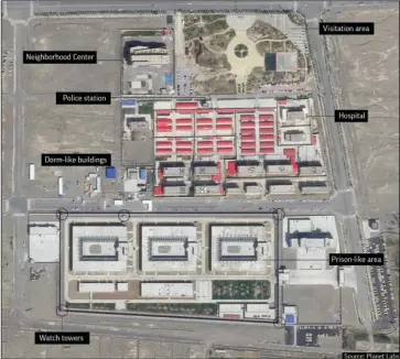  ?? The Associated Press ?? FORCED RE-EDUCATION CENTER: In this Sep. 17, 2018, file satellite image provided by Planet Labs, buildings are seen around the Kunshan Industrial Park in Artux in western China’s Xinjiang region. This is one of a number of internment camps in the Xinjiang region. Experts say the Chinese government has detained up to 1.8 million Uighurs, ethnic Kazakhs and other Muslim minorities for what it calls voluntary job training. But a classified blueprint leaked to news organizati­ons shows the camps are precisely what former detainees have described: Forced re-education centers.