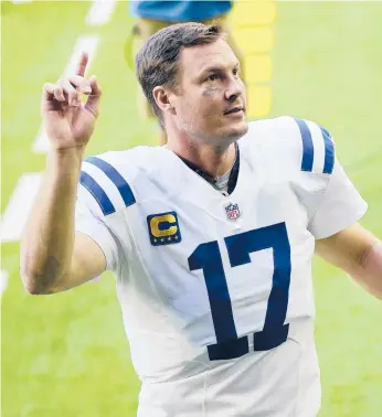  ?? DAVIDJ. PHILLIP/AP ?? In his first season with the Colts, veteran Pro Bowl QB Philip Rivers leads the team into the AFC playoffs.