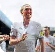  ??  ?? Luke Ayling celebrates scoring for Leeds