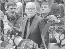  ?? BEN MCKEOWN/AP ?? Devils head coach Lindy Ruff, center, looks toward the ice during the Feb. 10 game against the Hurricanes in Raleigh, N.C.