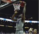  ?? Tribute News Service ?? Kansas State’s Levi Stockard III lays up a shot against Iowa State during the semifinals of the Big 12 Tournament at Sprint Center in Kansas City on March 15.