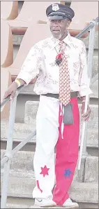  ?? ?? (LEFT) Mbabane Swallows supporter Sthawula Tsela wearing a unique necklace.