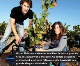  ??  ?? Michel Théron et sa femme au milieu de leurs vignes du Clos du Jaugueyron à Margaux. Ce couple passionné et attachant a retrouvé l'élégance et la buvabilité des grands Margaux d'autrefois.