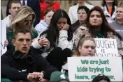  ?? PAUL SANCYA — THE ASSOCIATED PRESS ?? Current and former Michigan State University students rally at the capitol in Lansing on Wednesday. Alexandria Verner, Brian Fraser and Arielle Anderson were killed and other students remain in critical condition after a gunman opened fire on the campus of Michigan State on Monday night.