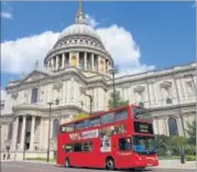  ??  ?? People ride the London bus