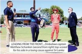  ?? ?? LEADING FROM THE FRONT... Zimbabwe captain Matthew Schonken (second from right) top-scored for his side in a losing cause against Sri Lanka