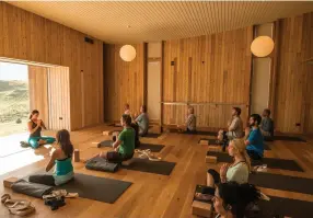  ??  ?? From above: The yoga room at Aro Hā Retreat in New Zealand; Sunset at Gwinganna Health Retreat.