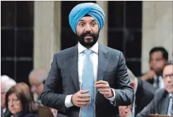  ?? JUSTIN TANG THE CANADIAN PRESS ?? Minister of Innovation, Science and Economic Developmen­t Navdeep Bains was in Hamilton Friday for the steel summit hosted at city hall.