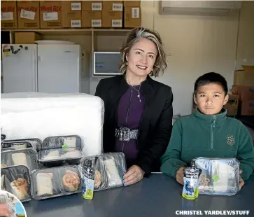  ?? CHRISTEL YARDLEY/STUFF ?? Nawton Primary School principal Rubina Charman and year 7 student Potiki Te Wiata, 11, with the school lunches. Potiki’s favourite lunch is wraps and chicken sandwiches, and his least favourite is pasta.
Inset: Fairfield College principal Richard Crawford.