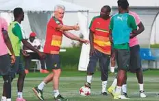  ?? AFP ?? Cameroon’s coach Hugo Broos directs players during a training session ahead of their match against Germany today.