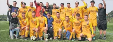  ??  ?? Mynydd Tigers celebrate winning the Anglesey League.