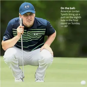  ?? — AP ?? On the ball: American Jordan Spieth lining up a putt on the eighth hole in the final round on Sunday.