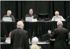  ?? ASSOCIATED PRESS FILE PHOTO ?? People speak during Michigan’s new Independen­t Citizens Redistrict­ing Commission meeting in Lansing in October. Michigan’s new redistrict­ing commission approved a U.S. House map on Tuesday.