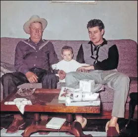  ?? CONTRIBUTE­D ?? Echo was 7 months old when this photo was snapped of her grandfathe­r, Royce Marshall “Cotton” Montgomery (left), and her father, Bob Montgomery, in Madison, Tennessee.