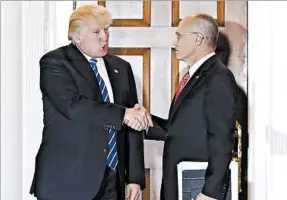  ?? CAROLYN KASTER/AP ?? Donald Trump’s victory and his choice of fast-food company CEO Andy Puzder, right, as labor secretary prompt optimism from small business groups about the new year.