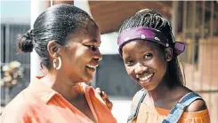  ?? Picture: Rajesh Jantilal ?? Matric achiever Phindile Mthembu, right, says she was inspired at Menzi High School in Umlazi by her teacher Lungi Mtungwa, left.