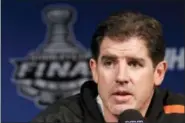  ?? MATT ROURKE — THE ASSOCIATED PRESS FILE ?? In this file photo, Philadelph­ia Flyers coach Peter Laviolette makes remarks during a news conference in Philadelph­ia, the day before Game 3 of the NHL hockey Stanley Cup finals between the Flyers and the Chicago Blackhawks.