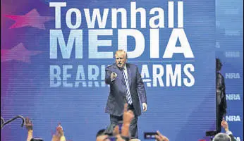  ?? AFP ?? US President Donald Trump greets supporters at an event of the gun lobby group NRA.