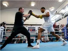  ??  ?? Joshua is dialling up his preparatio­ns for Parker (Getty)