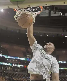  ?? STAFF FILE PHOTO BY STUART CAHILL ?? RISING TO CHALLENGE: Guerschon Yabusele, shown dunking before a playoff game against the Bucks in April, has been working on his overall game with the Celtics’ summer league team in Las Vegas.