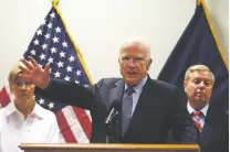  ?? RAHMAT GUL/THE ASSOCIATED PRESS ?? U.S. Sen. John McCain, R.-Ariz., center, speaks during a news conference Tuesday in Kabul, Afghanista­n. Sens. Elizabeth Warren, D-Mass, left, and Lindsey Graham, R-S.C., are seen in the background.