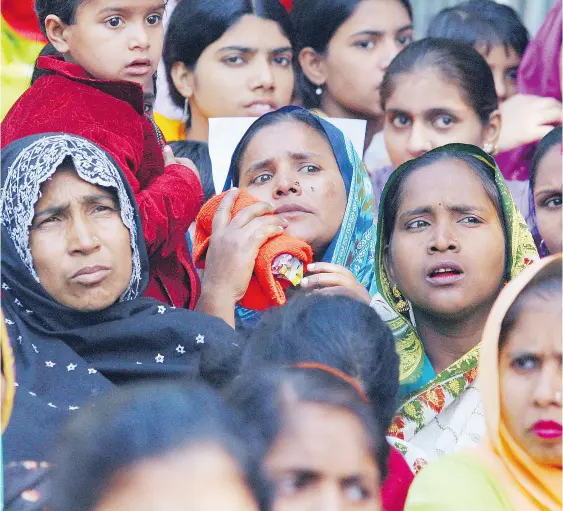  ?? RAVEENDRAN / AFP / GETTY IMAGES ?? Even though caste discrimina­tion was outlawed in India more than 50 years ago, many claim the country still has millions of “untouchabl­es” as a result of the caste system. Daughters of Destiny shows a small, hopeful slice of this story, Robert Fulford...