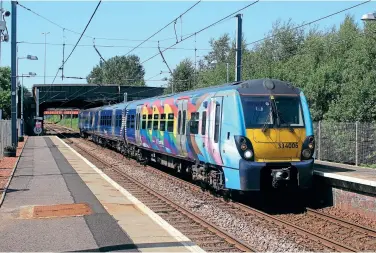  ??  ?? Scotrail has branded DMS 64106 of 334006 into a Progress flag instead of the traditiona­l rainbow design to promote Pride. The newer graphics include additional stripes and colours to represent more of the LGBTQ+ community. On July 15, the unit arrives at Whifflet with the 14:09 Dalmuir to Motherwell service. Stuart Fowler