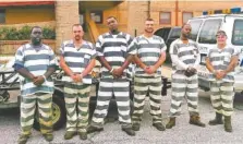  ?? POLK COUNTY SHERIFF’S OFFICE VIA THE NEW YORK TIMES ?? The six Polk County, Ga., inmates who helped a fallen sheriff’s deputy are pictured.