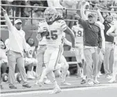  ?? MARK HUMPHREY/AP ?? UF running back Jordan Scarlett runs 48 yards for a touchdown in the second half Saturday in Nashville, Tenn.