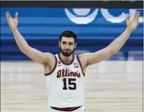  ?? MICHAEL CONROY - THE ASSOCIATED PRESS ?? Illinois forward Giorgi Bezhanishv­ili (15) celebrates during the second half of an NCAA college basketball championsh­ip game against Ohio State at the Big Ten Conference tournament, Sunday, March 14, 2021, in Indianapol­is.