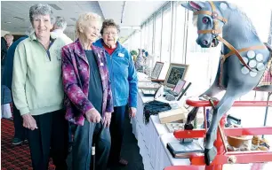  ??  ?? Right: Admiring some of the collection­s on display are Drouin Hills Club members (from left) Ethel Manley, Lorna Parke and Pam Pretty