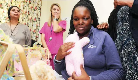  ?? Picture: Henk Kruger/African News Agency (ANA) ?? STUNNED: Khayelitsh­a resident Inganathi Mafenuka says she only believed she had carried quadruplet­s when she saw them after giving birth on Friday at Tygerberg Hospital.