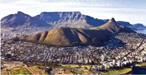  ??  ?? POINT OF VIEW: Sea Point, wedged between ocean and mountain